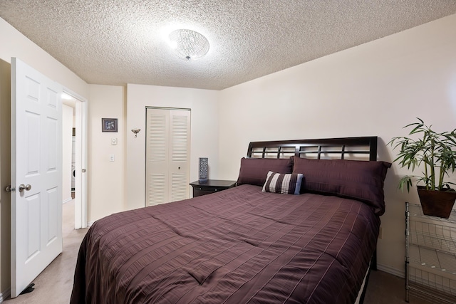 10321 E Main Ave Ste 104, Spokane, WA 99206 - bedroom with a closet, carpet flooring, and a textured ceiling