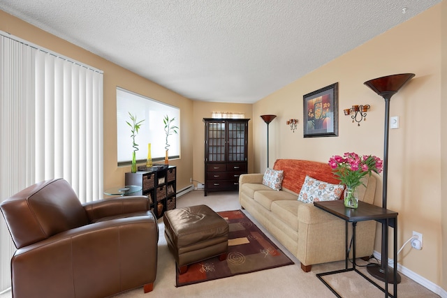 10321 E Main Ave Ste 104, Spokane, WA 99206 - carpeted living area with baseboards, a textured ceiling, and a baseboard radiator