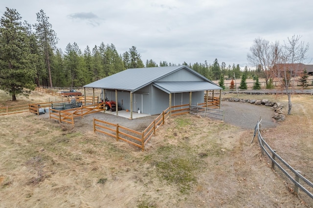 428 N Kynan Ln, Spokane, WA 99224 - exterior space featuring an exterior structure, metal roof, and an outdoor structure