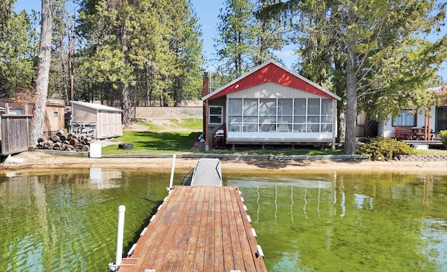 view of dock with a water view