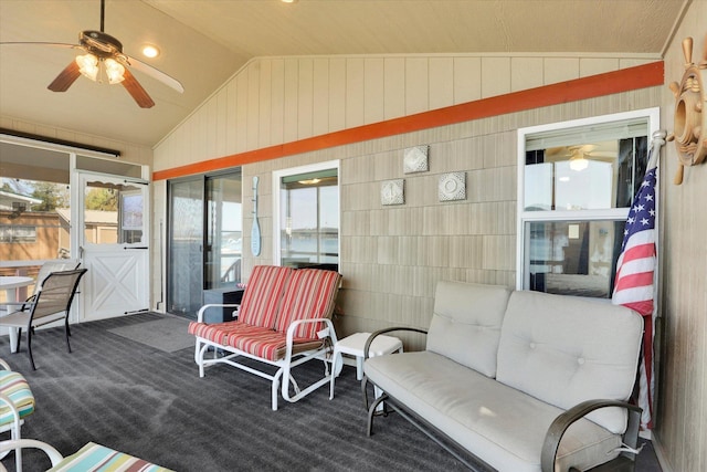 sunroom with ceiling fan and an outdoor hangout area