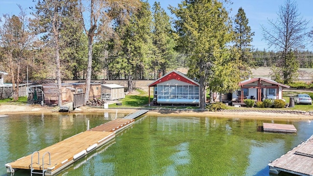 dock area with a water view