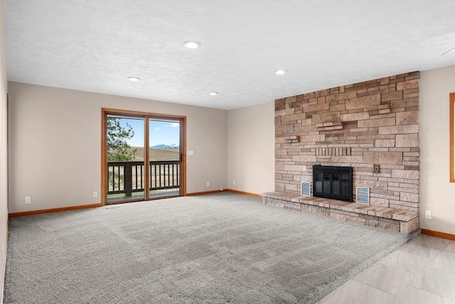 12115 E Wedgewood Ct, Spokane, WA 99217 - unfurnished living room with baseboards, a stone fireplace, and recessed lighting