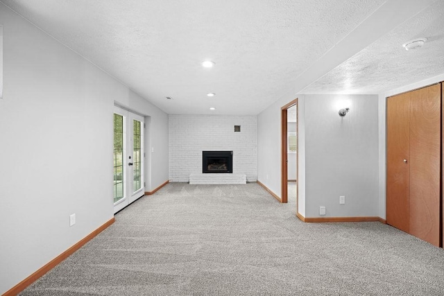 12115 E Wedgewood Ct, Spokane, WA 99217 - unfurnished living room featuring baseboards, carpet, a textured ceiling, and a brick fireplace