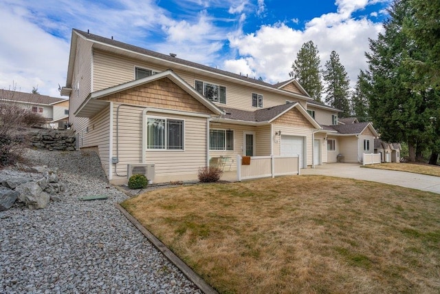 146 Laurelhurst Dr Unit 146, Newport, WA 99156 - traditional-style house with a front yard, a garage, and driveway