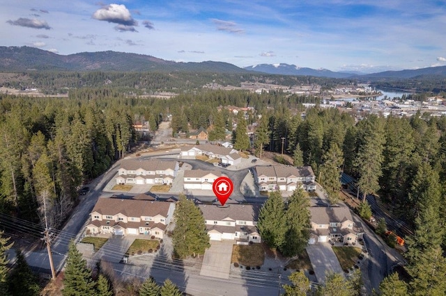 146 Laurelhurst Dr Unit 146, Newport, WA 99156 - aerial view featuring a mountain view and a view of trees