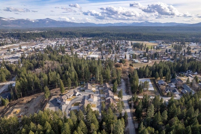 146 Laurelhurst Dr Unit 146, Newport, WA 99156 - aerial view featuring a mountain view and a view of trees