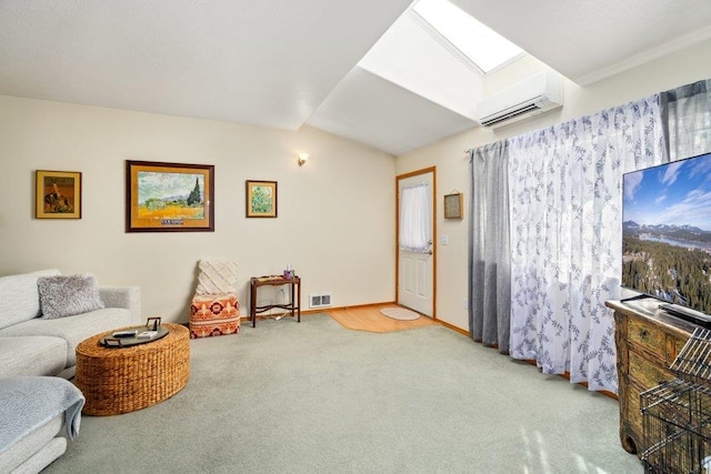 146 Laurelhurst Dr Unit 146, Newport, WA 99156 - living room featuring a wall mounted air conditioner, vaulted ceiling with skylight, visible vents, carpet floors, and baseboards