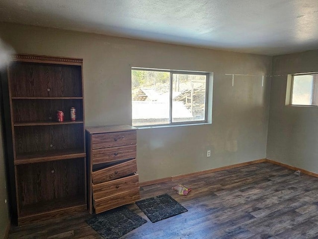 3610 Sand Creek Rd, Kettle Falls, WA 99141 - unfurnished bedroom with wood finished floors and baseboards