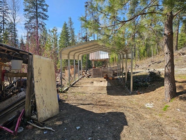 3610 Sand Creek Rd, Kettle Falls, WA 99141 - view of yard with a carport