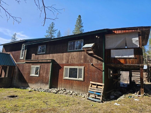 3610 Sand Creek Rd, Kettle Falls, WA 99141 - rear view of property featuring metal roof