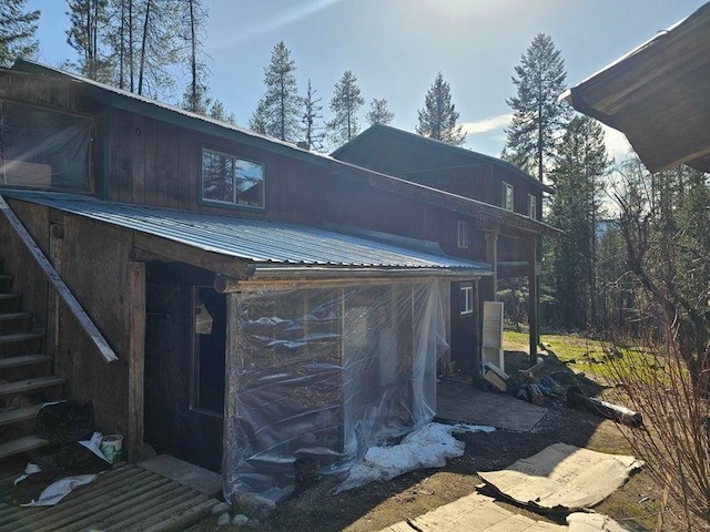 3610 Sand Creek Rd, Kettle Falls, WA 99141 - view of outbuilding featuring stairway