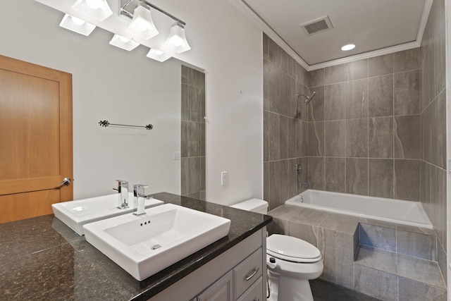 4720 S Wildwood Ln, Spokane, WA 99206 - bathroom featuring tiled shower / bath combo, toilet, vanity, and visible vents