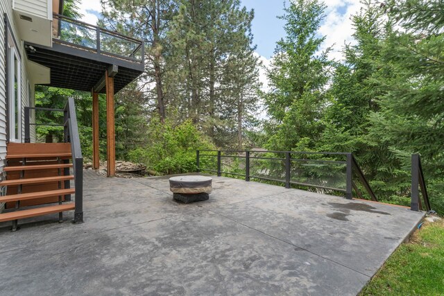 4720 S Wildwood Ln, Spokane, WA 99206 - view of patio featuring an outdoor fire pit and stairs