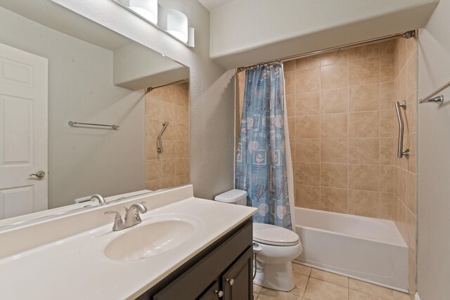 4720 S Wildwood Ln, Spokane, WA 99206 - full bathroom featuring shower / bath combination with curtain, toilet, vanity, and tile patterned flooring