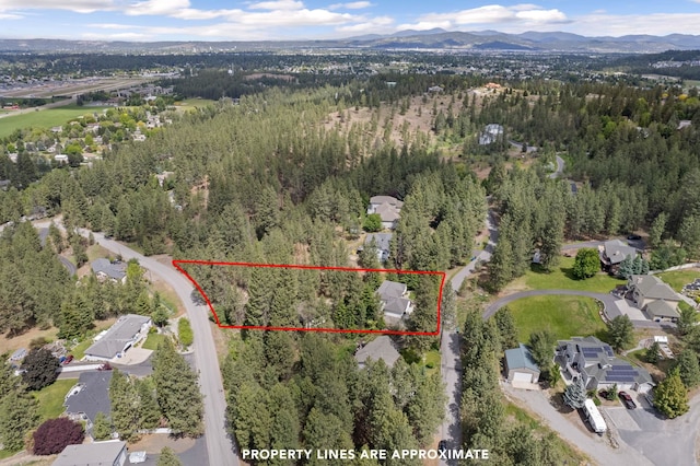 4720 S Wildwood Ln, Spokane, WA 99206 - aerial view featuring a wooded view and a mountain view