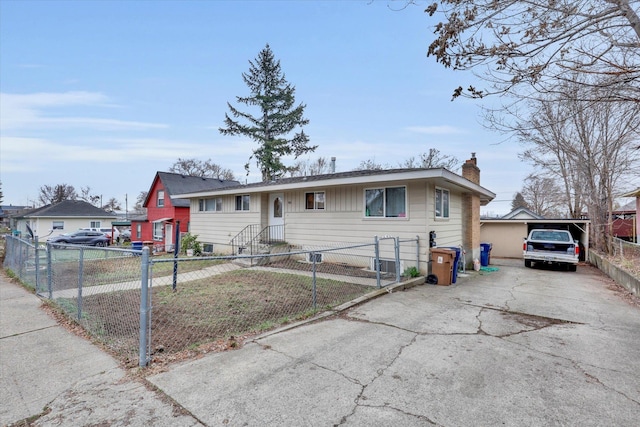 908 E Rockwell Avenue 910E Rockwell Ave, Spokane, WA 99207 - view of front facade featuring a chimney, a fenced front yard, and concrete driveway