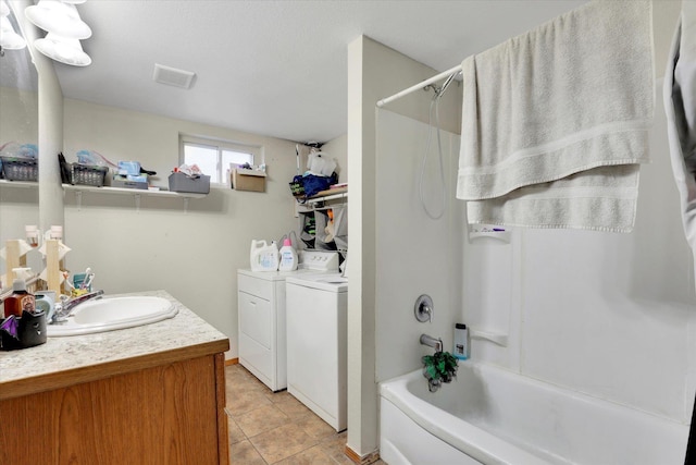 908 E Rockwell Avenue 910E Rockwell Ave, Spokane, WA 99207 - bathroom featuring vanity, washer and dryer, and bathing tub / shower combination