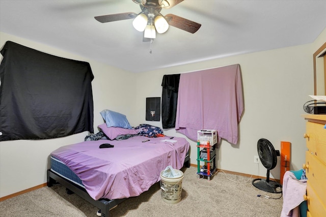 908 E Rockwell Avenue 910E Rockwell Ave, Spokane, WA 99207 - carpeted bedroom with baseboards and ceiling fan