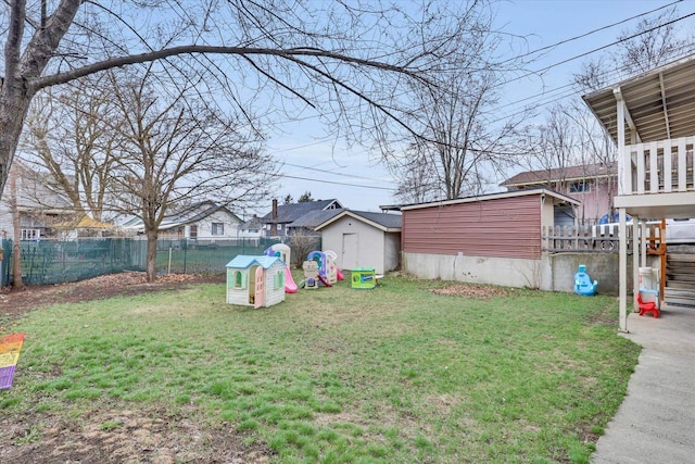 908 E Rockwell Avenue 910E Rockwell Ave, Spokane, WA 99207 - view of yard with a fenced backyard, an outbuilding, and a shed