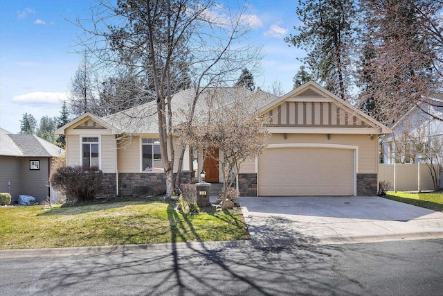 view of front of house with a garage, stone siding, a front lawn, and concrete driveway