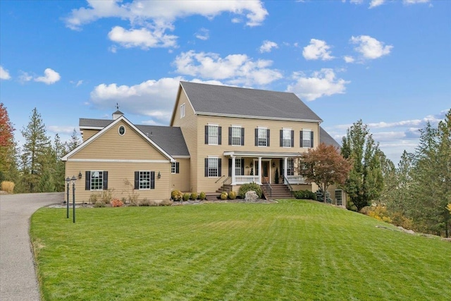 6808 S Jackson Ridge Ln, Greenacres, WA 99016 - colonial home featuring a front lawn and a porch