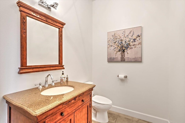6808 S Jackson Ridge Ln, Greenacres, WA 99016 - half bath with baseboards, toilet, vanity, and tile patterned floors