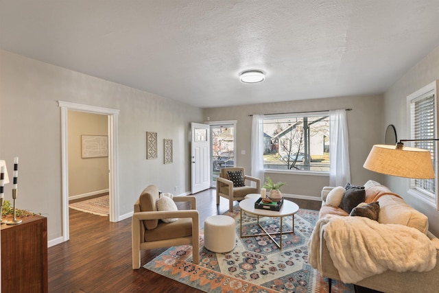 office featuring baseboards and dark wood-style flooring
