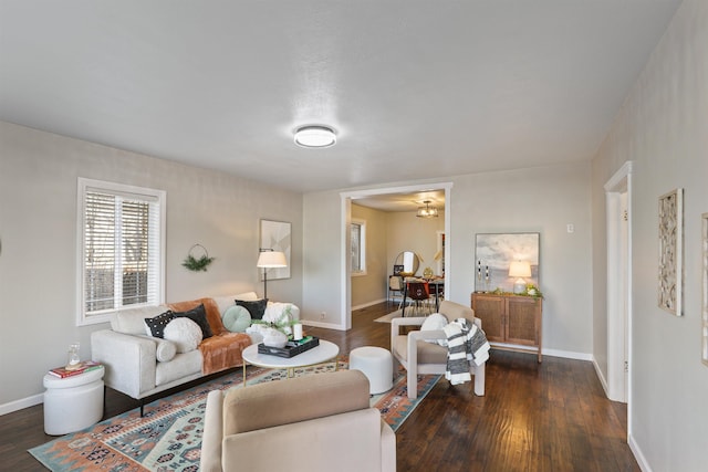 dining room featuring visible vents, dark wood-style flooring, and baseboards