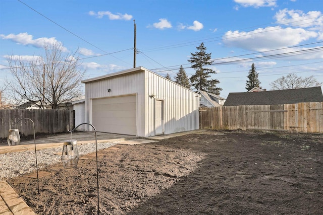 garage with fence