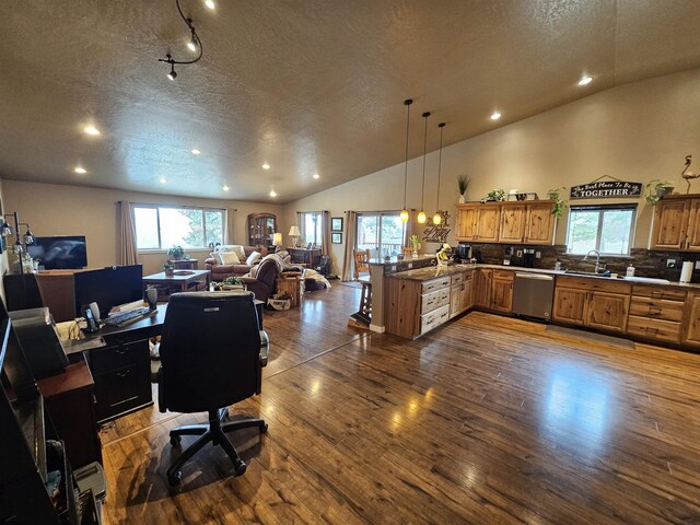 21319 E Harvard Vistas Ln, Newman Lake, WA 99025 - office with a textured ceiling, recessed lighting, dark wood-type flooring, plenty of natural light, and vaulted ceiling