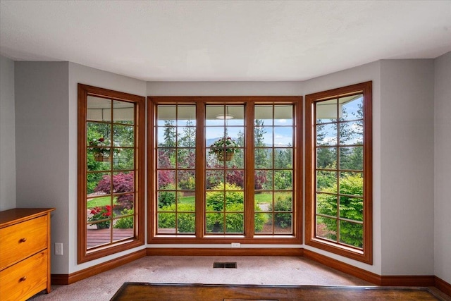 6814 S Jackson Ridge Ln, Greenacres, WA 99016 - doorway to outside with baseboards and carpet flooring