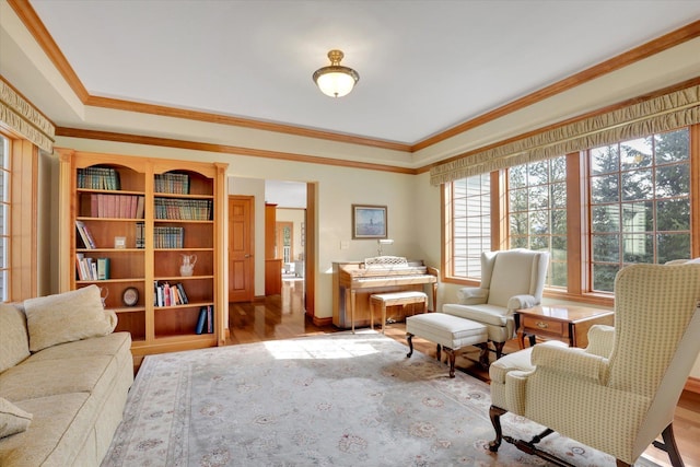 6814 S Jackson Ridge Ln, Greenacres, WA 99016 - sitting room featuring crown molding, wood finished floors, and baseboards