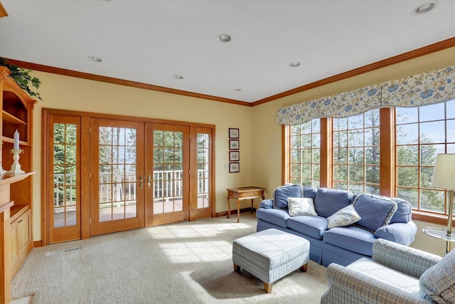 6814 S Jackson Ridge Ln, Greenacres, WA 99016 - carpeted living area with healthy amount of natural light, french doors, crown molding, baseboards, and recessed lighting
