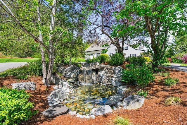 6814 S Jackson Ridge Ln, Greenacres, WA 99016 - view of yard with a small pond