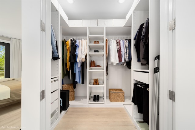 27809 N Bruce Rd, Chattaroy, WA 99003 - spacious closet featuring light wood-type flooring