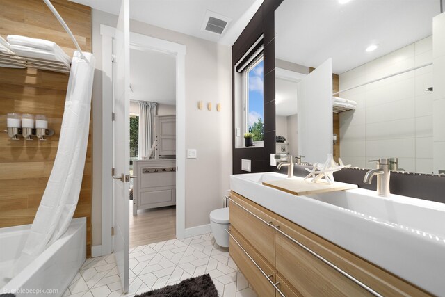 27809 N Bruce Rd, Chattaroy, WA 99003 - full bathroom with visible vents, toilet, tile patterned floors, a sink, and shower / tub combo with curtain