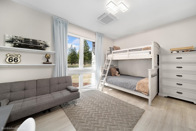 27809 N Bruce Rd, Chattaroy, WA 99003 - bedroom featuring light wood-type flooring and visible vents