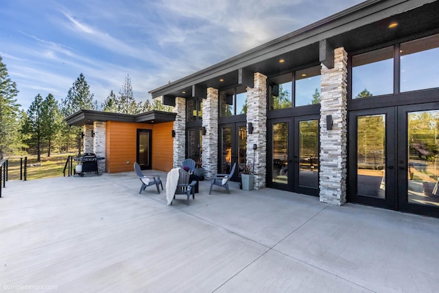 27809 N Bruce Rd, Chattaroy, WA 99003 - view of patio featuring a grill and french doors