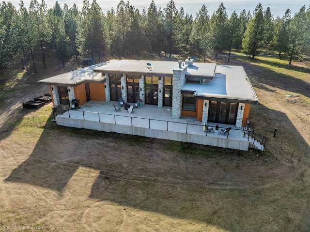 27809 N Bruce Rd, Chattaroy, WA 99003 - back of house featuring stone siding