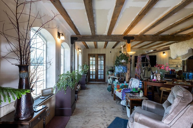 4004P N Northport Flat Creek Rd, Northport, WA 99157 - living area with wooden walls, arched walkways, french doors, and beam ceiling
