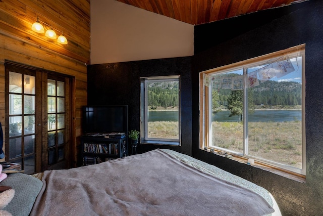 4004P N Northport Flat Creek Rd, Northport, WA 99157 - bedroom featuring french doors, multiple windows, wood ceiling, and lofted ceiling