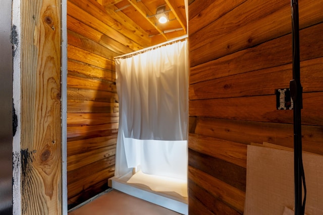 4004P N Northport Flat Creek Rd, Northport, WA 99157 - bathroom with wooden walls and a shower with curtain