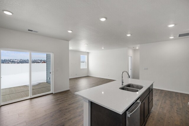 805 E 5th St, Deer Park, WA 99006 - kitchen with visible vents, light countertops, a sink, and stainless steel dishwasher