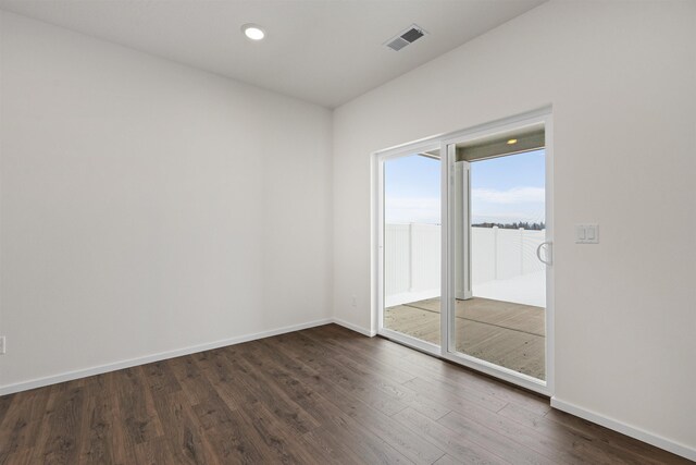 805 E 5th St, Deer Park, WA 99006 - unfurnished room with dark wood-style floors, visible vents, recessed lighting, and baseboards