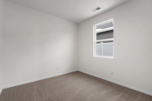805 E 5th St, Deer Park, WA 99006 - carpeted empty room featuring baseboards and visible vents