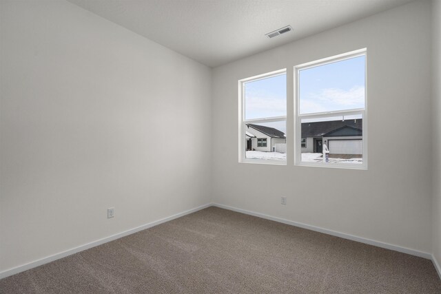 805 E 5th St, Deer Park, WA 99006 - carpeted spare room with baseboards and visible vents