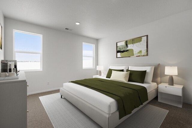 805 E 5th St, Deer Park, WA 99006 - bedroom featuring dark colored carpet, recessed lighting, baseboards, and visible vents