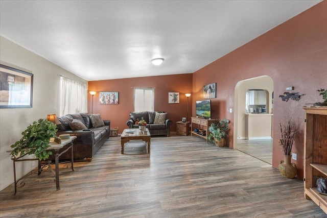 1810 W Paradise Rd, Spokane, WA 99224 - living room with arched walkways and wood finished floors