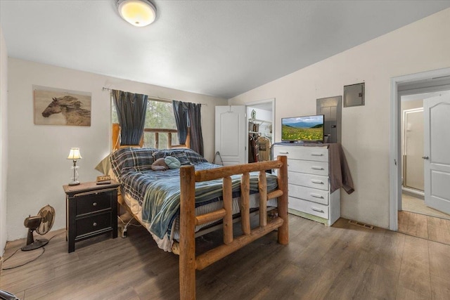 1810 W Paradise Rd, Spokane, WA 99224 - bedroom featuring visible vents, vaulted ceiling, and wood finished floors
